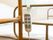 ベッド柵に、電動ベッドのリモコンが付けられている。頭や足のみならず、高さも変えることができるスリーモーター式である。