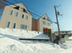 穏やかな雪景色の住宅地