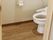 スペースが確保されたトイレには、温水洗浄便座器が完備されている。安全な移動ができ快適に用をたすことができる。