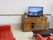 ソファーセットの前にはテレビが置かれている。入居者様が自由にテレビを見たり、おしゃべりを楽しんだりできる憩いの場所。