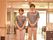 2名の男女のスタッフの写真。上にグレーと白のシャツを着用している。左胸のポケットにはペン等が入っている。