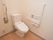 毎日使用するトイレは、ストレスがないようスペースを十分に確保している。足元には障害物がなく、すっきりとしている。