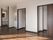 広々としたフローリングの居室は日当たりが良い明るい部屋。建具の色が統一され、落ち着いた雰囲気の部屋。