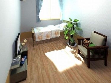 ワンルームタイプの部屋は、入って正面に窓がある。ベッド、テレビとソファーなどを配置して、快適な個室にできる。