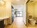 広々とした居室。引き戸が大きく開く、両側に手すりがついたトイレや、大きな鏡の付いた洗面台、造り付けのクローゼットも備わっている。
