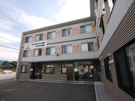 やさしい色合の外観