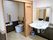 居室内トイレと洗面台がある。ドアはスライド式