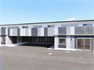 横に長い２階建ての建物の様子。グループホームリエゾン宇治おおくぼの外観写真
