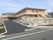 「あずみ苑 グランデ常盤平」の外観。平野建てと緑豊かな環境にある、2階建ての施設になっている。
