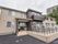 一軒家風の外見の2階建ての建物である。レンガ調と木材を使った外壁であり、一部ウッドデッキのベランダが設置されている。