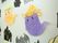 イラストの形に合わせて切り取った塗り絵が、壁に貼ってある。季節感がある飾りで、共有スペースの雰囲気を明るくしている。