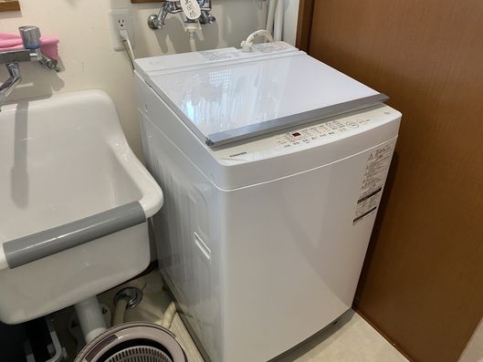 洗面台とコインランドリー