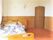 個室仕様の部屋の中にbエッドが置いてある写真。収納設備があるのが見えている写真