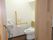 お部屋には車いす対応の全開扉のトイレが付いている
