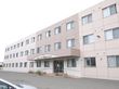 鉄筋コンクリート造５階建ての落ち着いた色調の外観の老人ホーム
