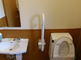 居室のトイレ設備を備えた部屋