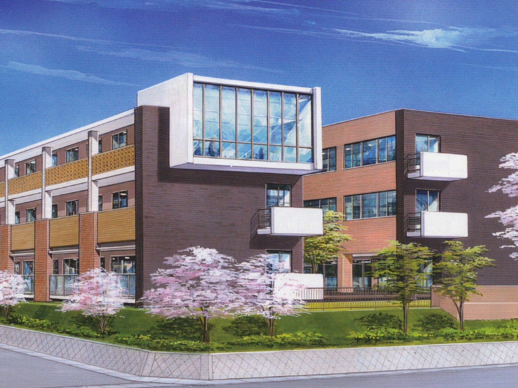 ブラウン系の３階建ての建物が２棟並んで建っていて、周りには桜の木や草木が多く植えられている。