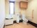 オスメイトや洗面台が置いてある施設内のトイレの様子
