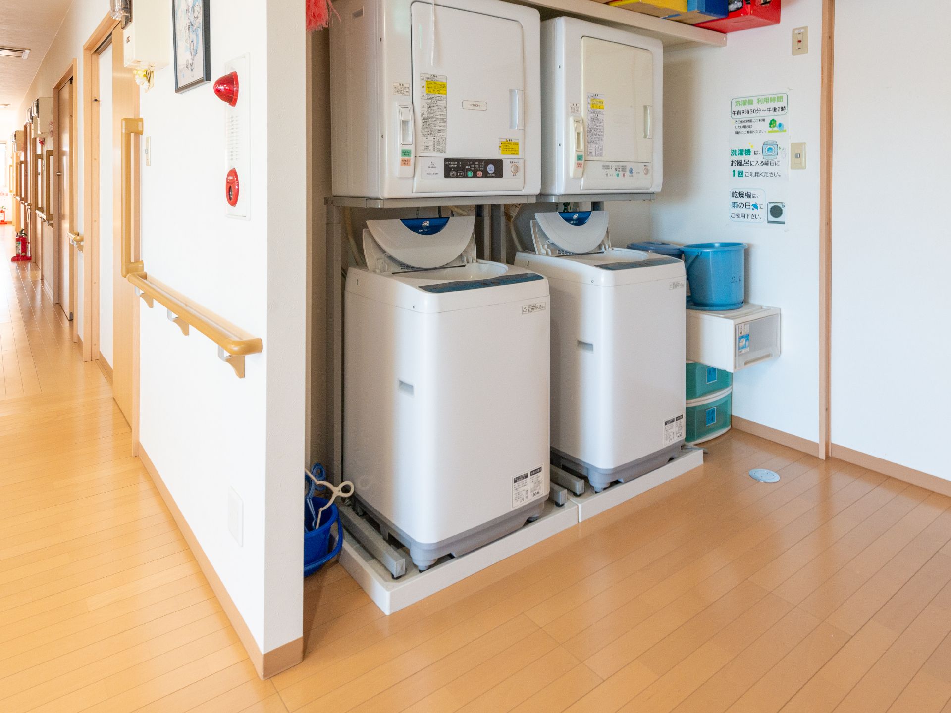 入居者が利用できる洗濯機、乾燥機が置かれているランドリー