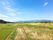 館内からは広大な田んぼが広がる風景が広がっている。奥には鈴鹿山脈が見える。