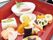 赤いお重風の入れ物の中にきれいに盛られた料理の数々。目で楽しめるよう工夫されている。