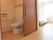 居室にはベッドが設置され、トイレは引き戸。手すりなどが付いた広い造り。