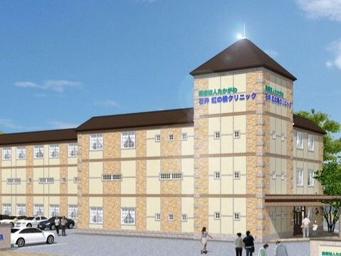 白とオレンジの外観の建物
