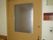 個室の木製扉と表示
