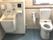 トイレは広く手すりが付き、洗い場もついている。