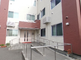 介護施設の外観と駐輪場