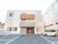 屋根・外壁ともに落ち着いた色合いの介護施設の外観