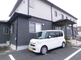 介護施設の外観と駐車場