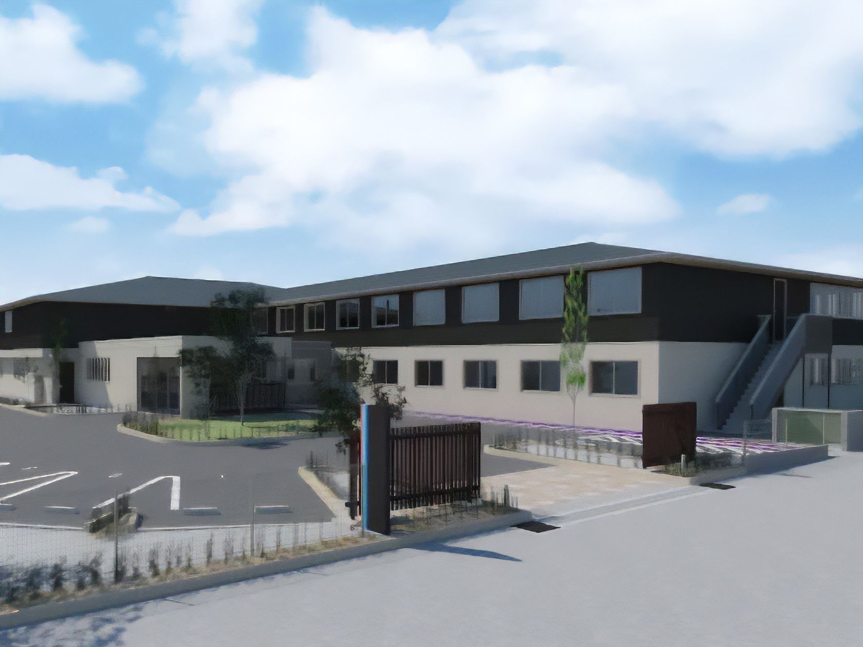 2階建てで駐車スペースが付き、フロアごとに外壁の色が異なる。周囲には木や花も植えられている。