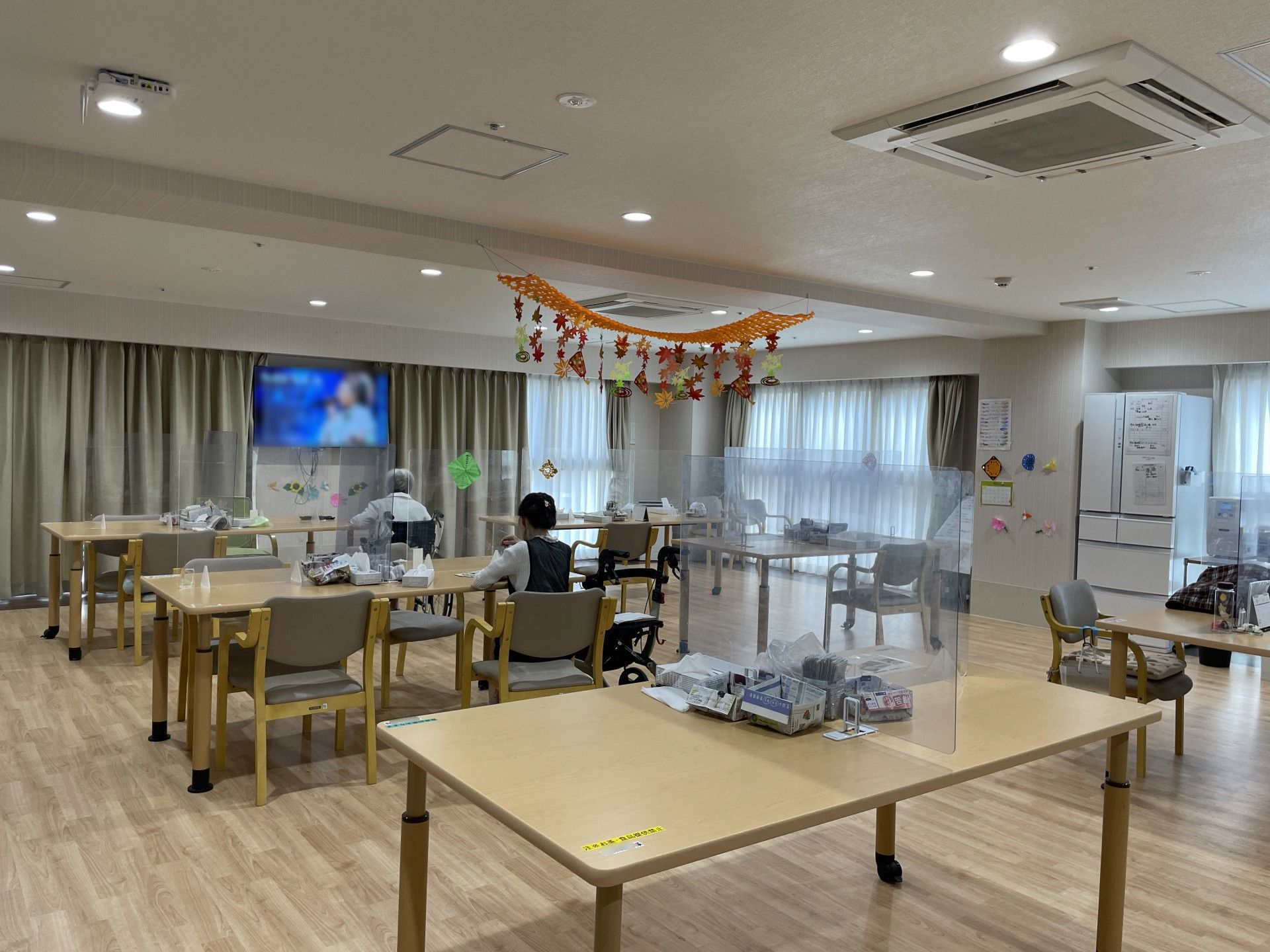 テレビを見る2枚の利用者様