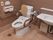 壁面にウォシュレットの操作パネルと、呼び出しブザーがあるトイレで、座ったままでも紐が引っ張ることができるようになっている。