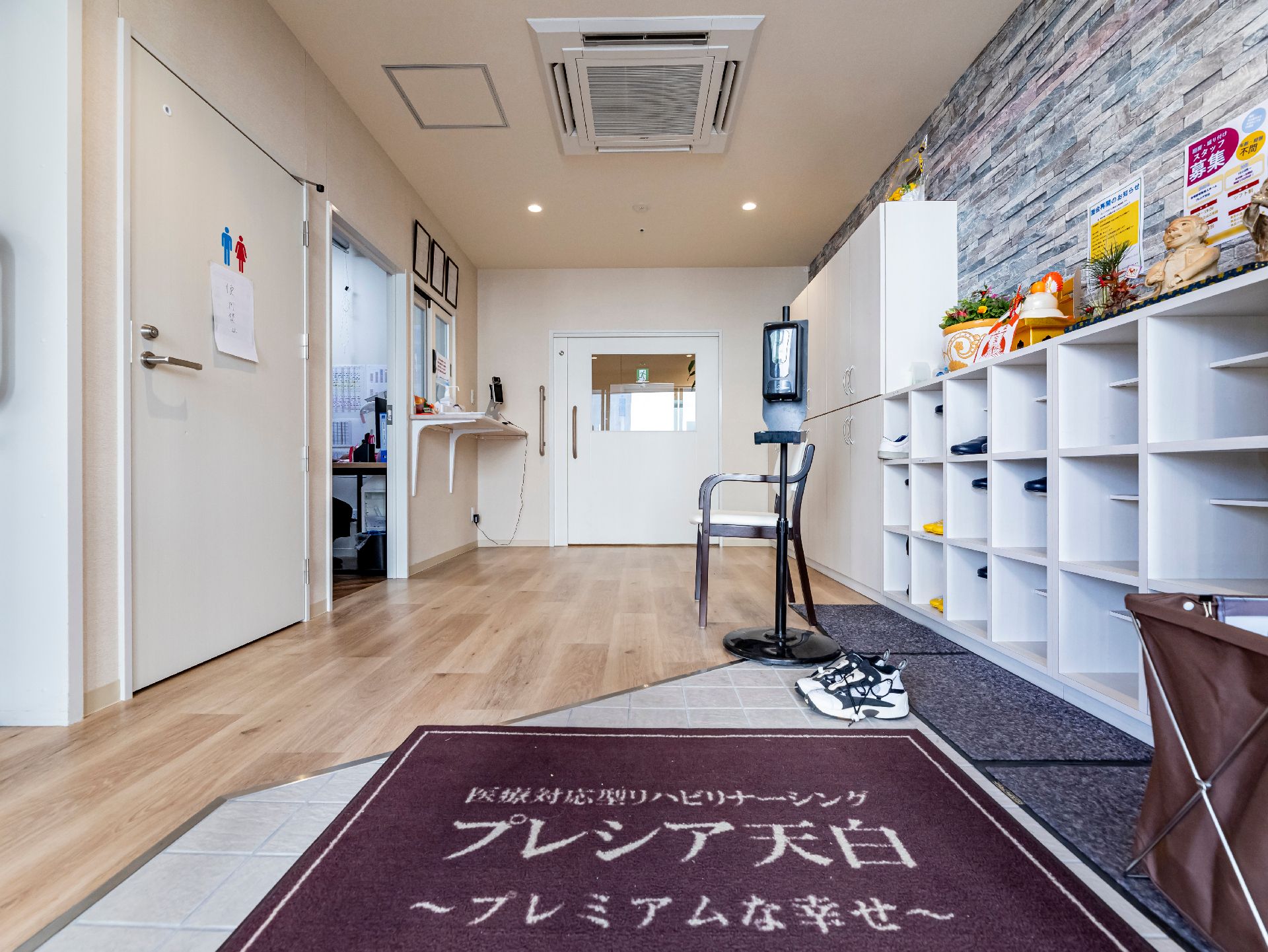 マットが敷いてある玄関