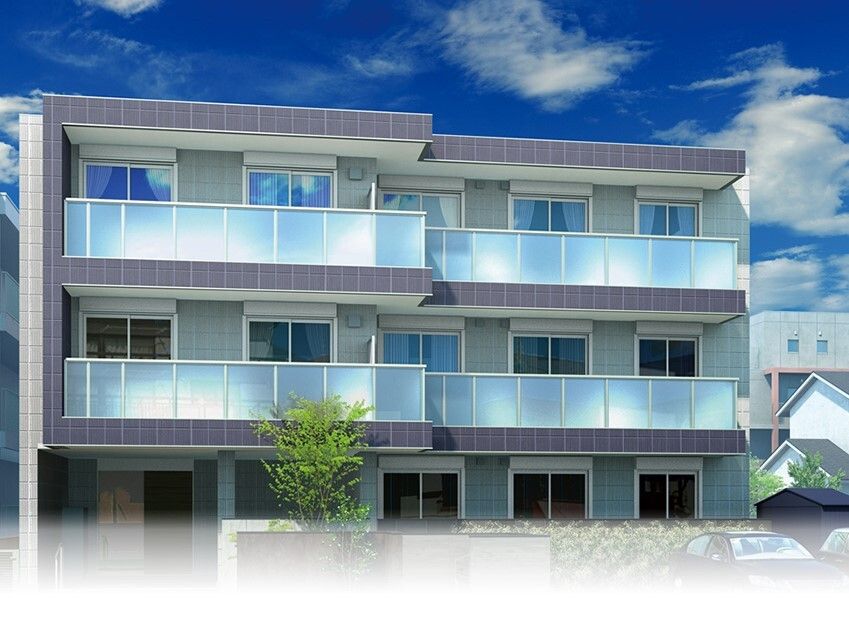 3階建ての建物の周りには草木が植えられ、各フロアにベランダがある。日当たりのいい場所に建っている。