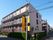 「スーパー・コート東住吉2号館」の案内がある4階建ての建物