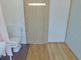 明るい個室の介護施設の部屋