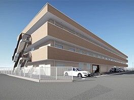 屋外階段やベランダが付いたブラウン系の3階建ての建物は日当たりのいい場所に建っている。