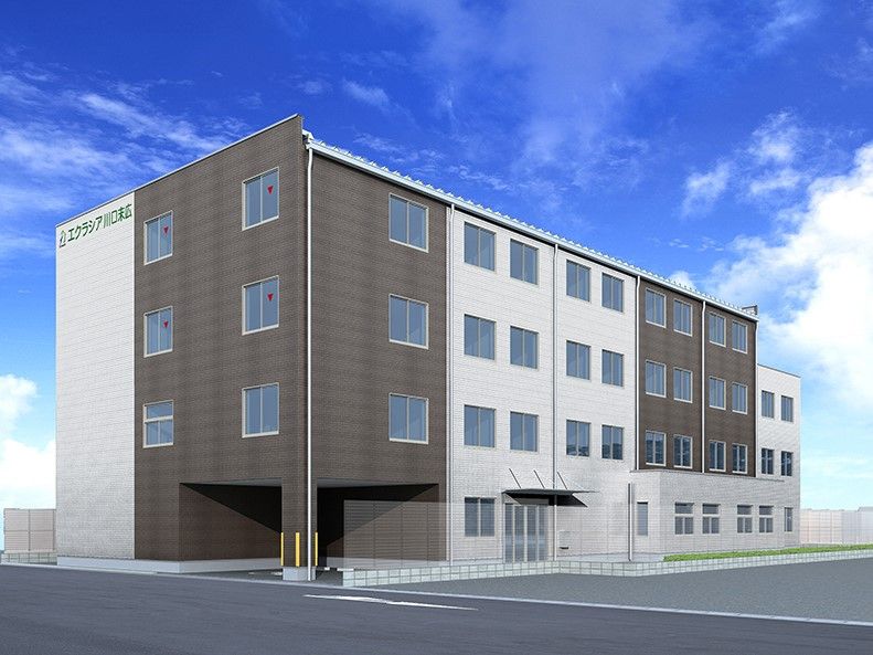 エクラシア川口末広と書かれている、ツートンカラーの外壁の4階建て建築物