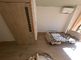 明るい個室の介護施設の部屋
