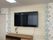 壁掛けテレビのある部屋