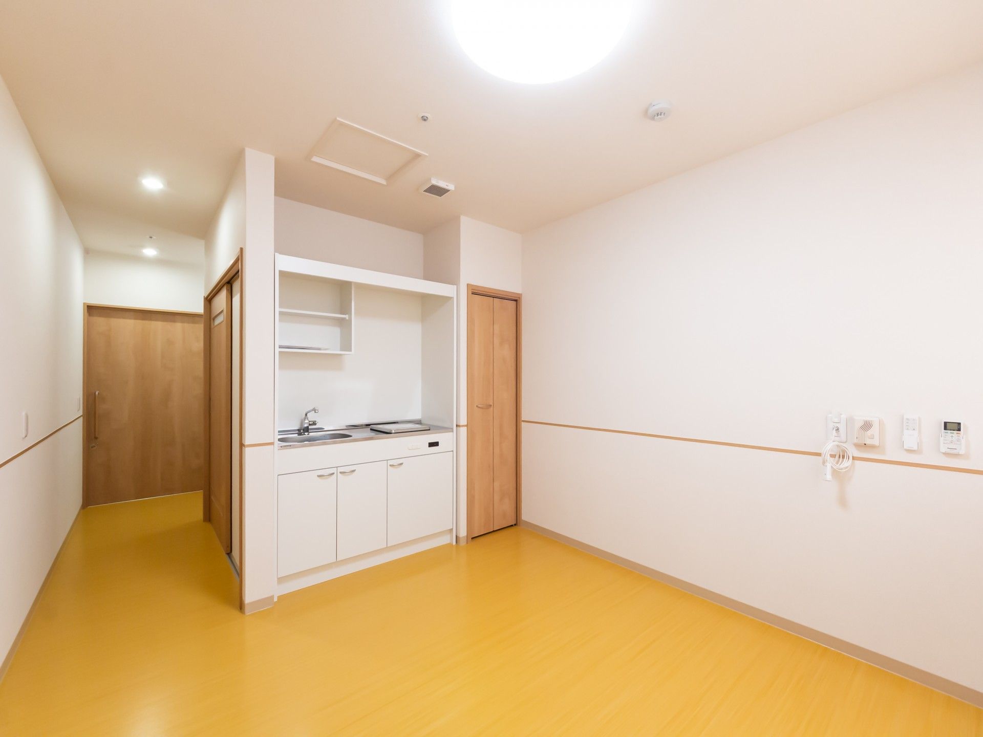 清潔なキッチン付き部屋