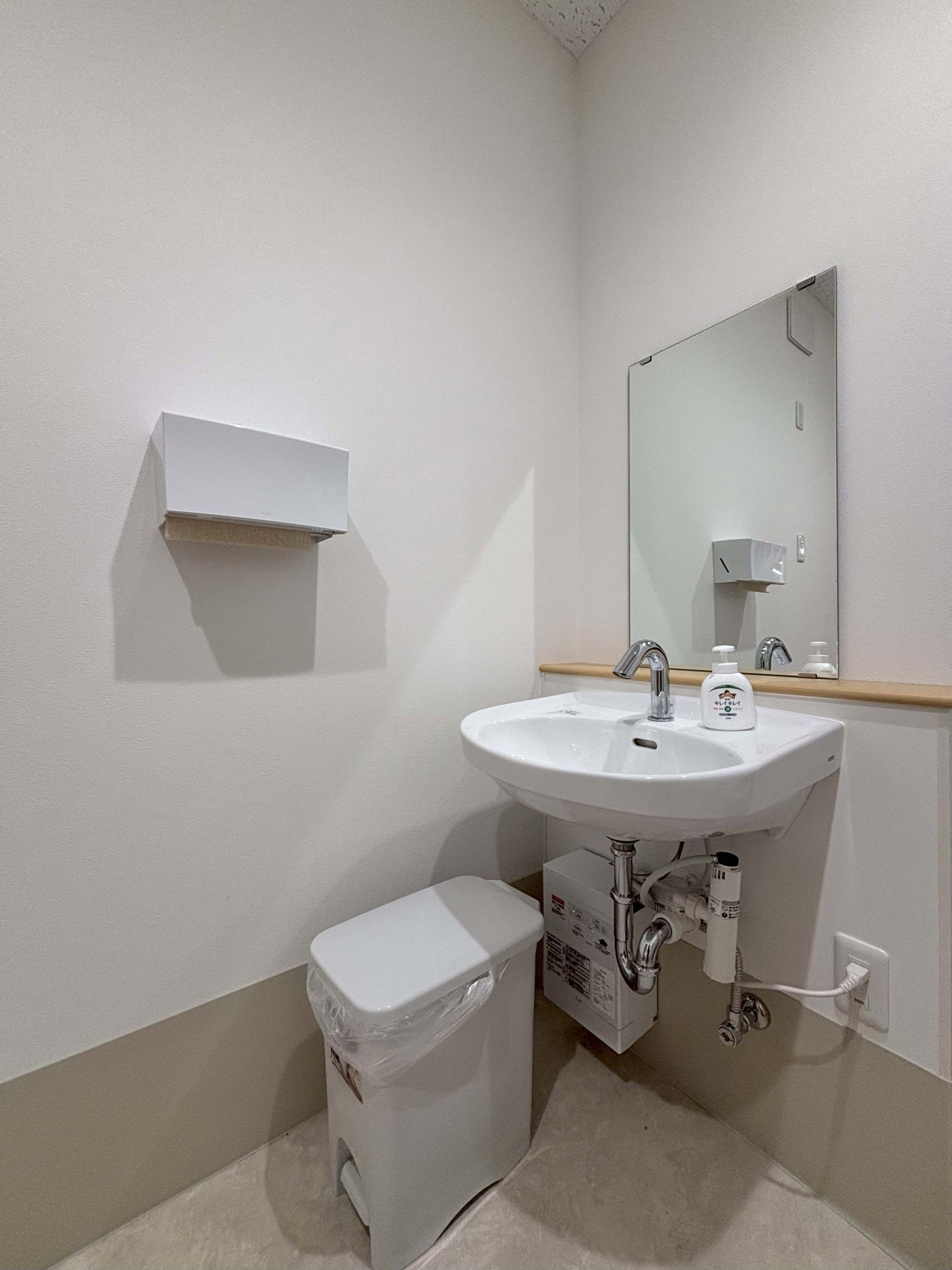 清潔な洗面台の一角