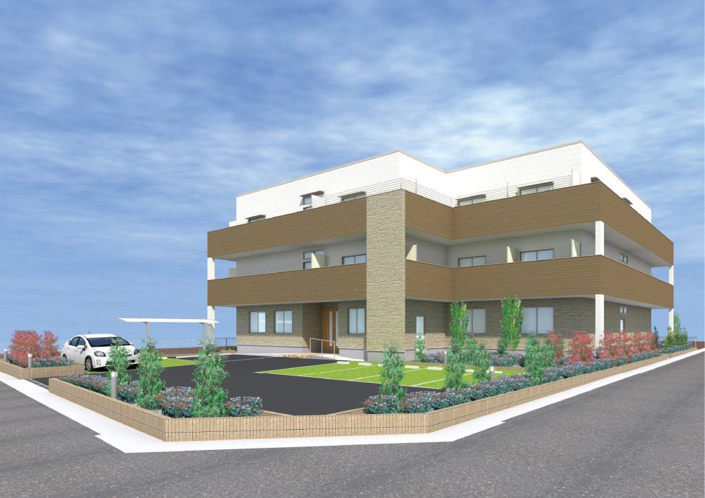 緑に囲まれた建物外観