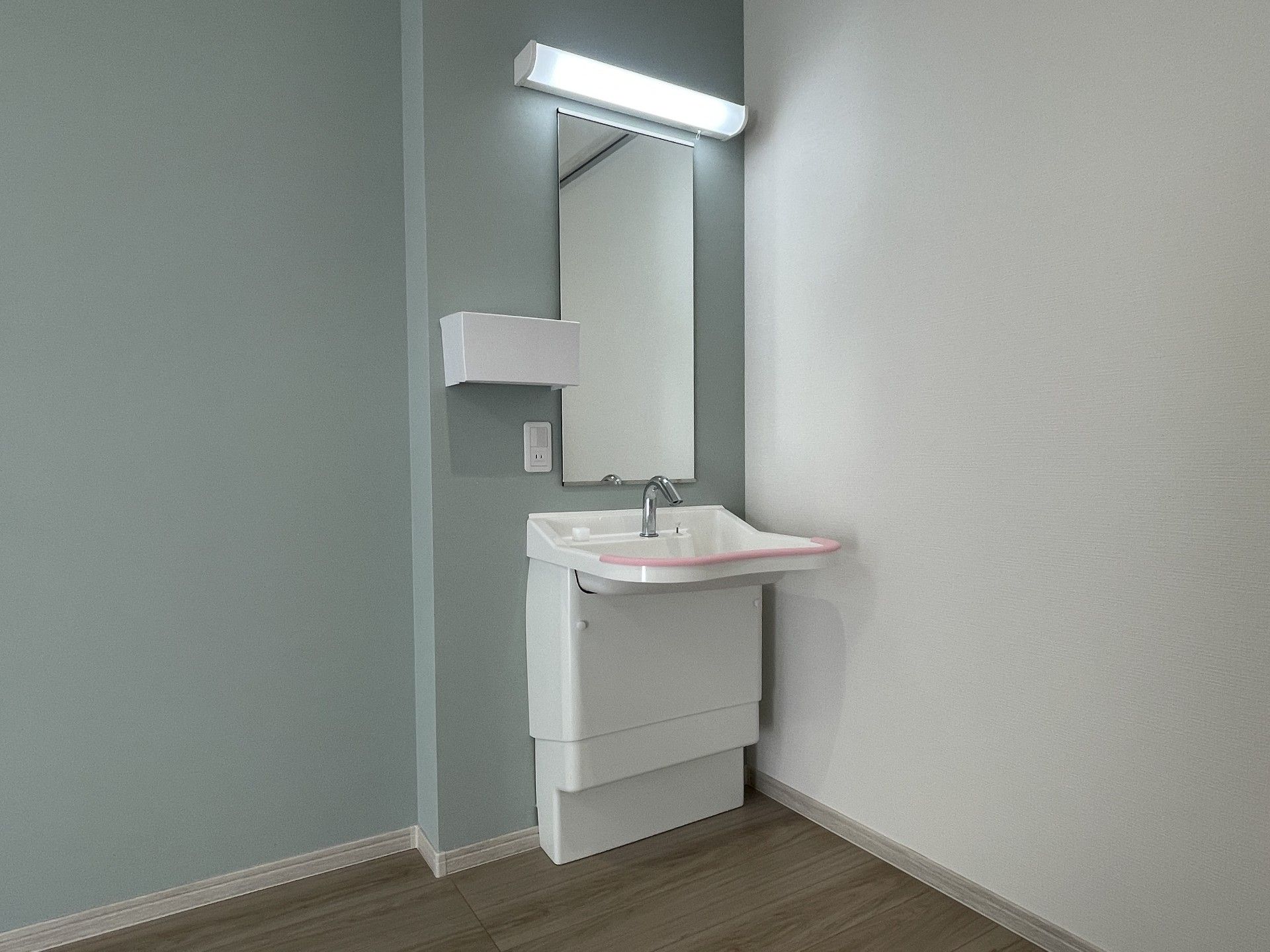 清潔な洗面台の一角