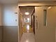 明るい廊下と居室の入口