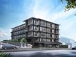 緑に囲まれた建物外観